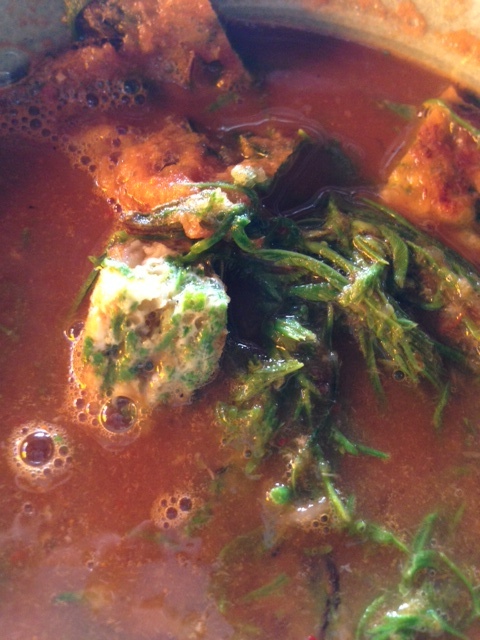 Sour curry with cha om