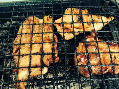 Pork shoulder on the grill at Pa Oun