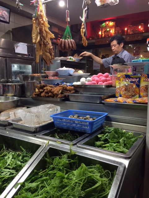 Sangchai's shopfront with your choice of seasonal proteins and greens