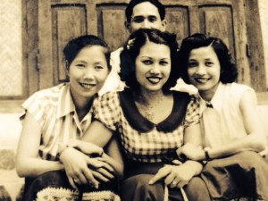 Grandma with friends, grandpa hiding behind her