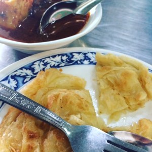 Flaky roti and massaman beef curry at Yusup Pochana
