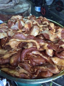 Marinating meat ready for the grill at Jay Dang on Petchburi